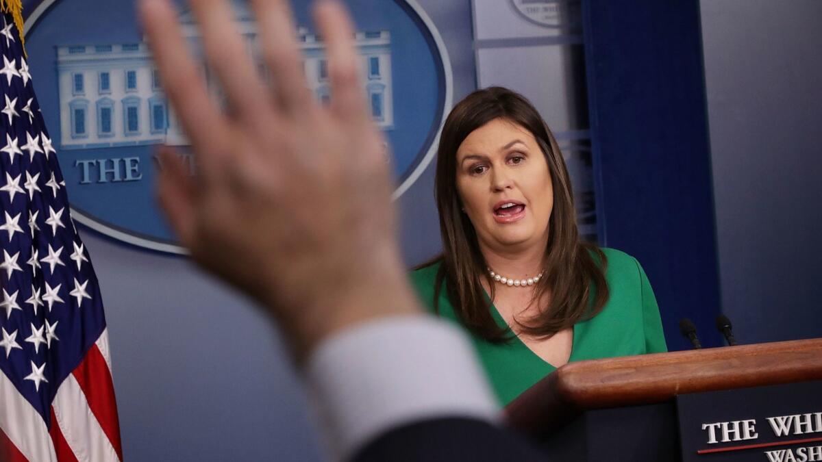 White House Press Secretary Sarah Huckabee Sanders conducts a news conference on Aug. 15, 2018.
