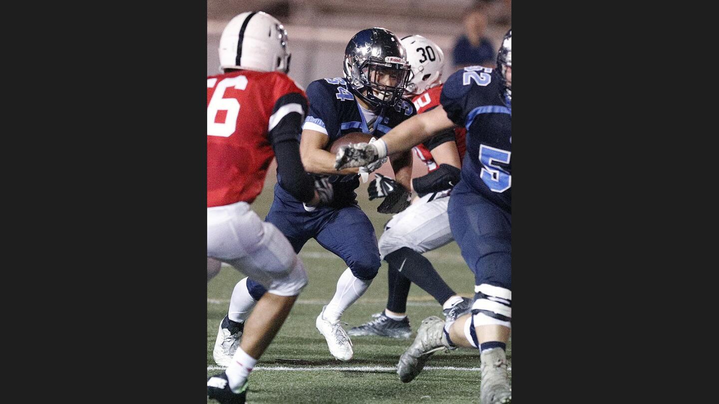 Photo Gallery: Crescenta Valley vs. Glendale in Pacific League football and the Crescenta Valley marching band takes the field in Halloween costumes