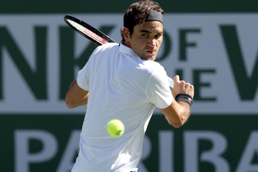 INDIAN WELLS, CALIFORNIA - MARCH 13: Roger Federer of Switzerland returns a shot to Kyle Edmund of Great Britain during the BNP Paribas Open at the Indian Wells Tennis Garden on March 13, 2019 in Indian Wells, California. (Photo by Matthew Stockman/Getty Images) ** OUTS - ELSENT, FPG, CM - OUTS * NM, PH, VA if sourced by CT, LA or MoD **