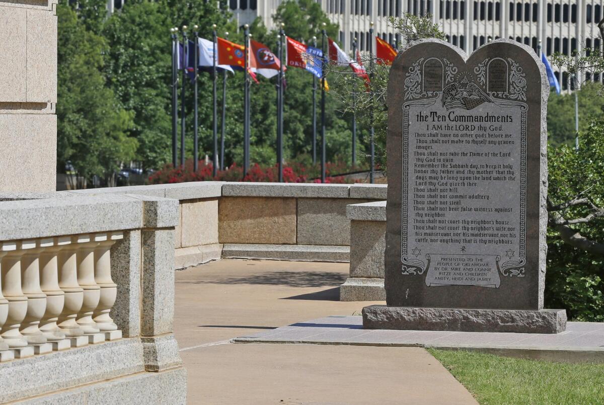 The Ten Commandments monument at the state Capitol in Oklahoma City. The state Supreme Court ruled that the monument violates the state constitution and therefore must be removed.