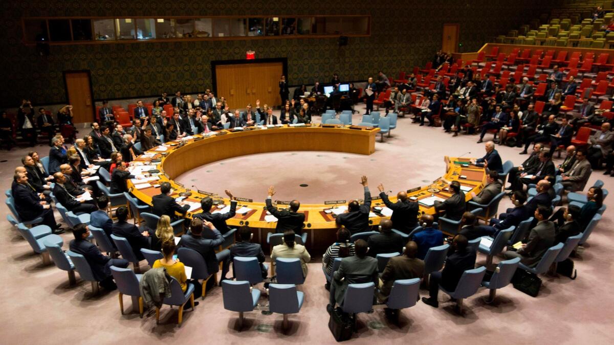 Members of the Security Council vote on Feb. 24, 2018, in New York during a United Nations Security Council meeting on a cease-fire in Syria.