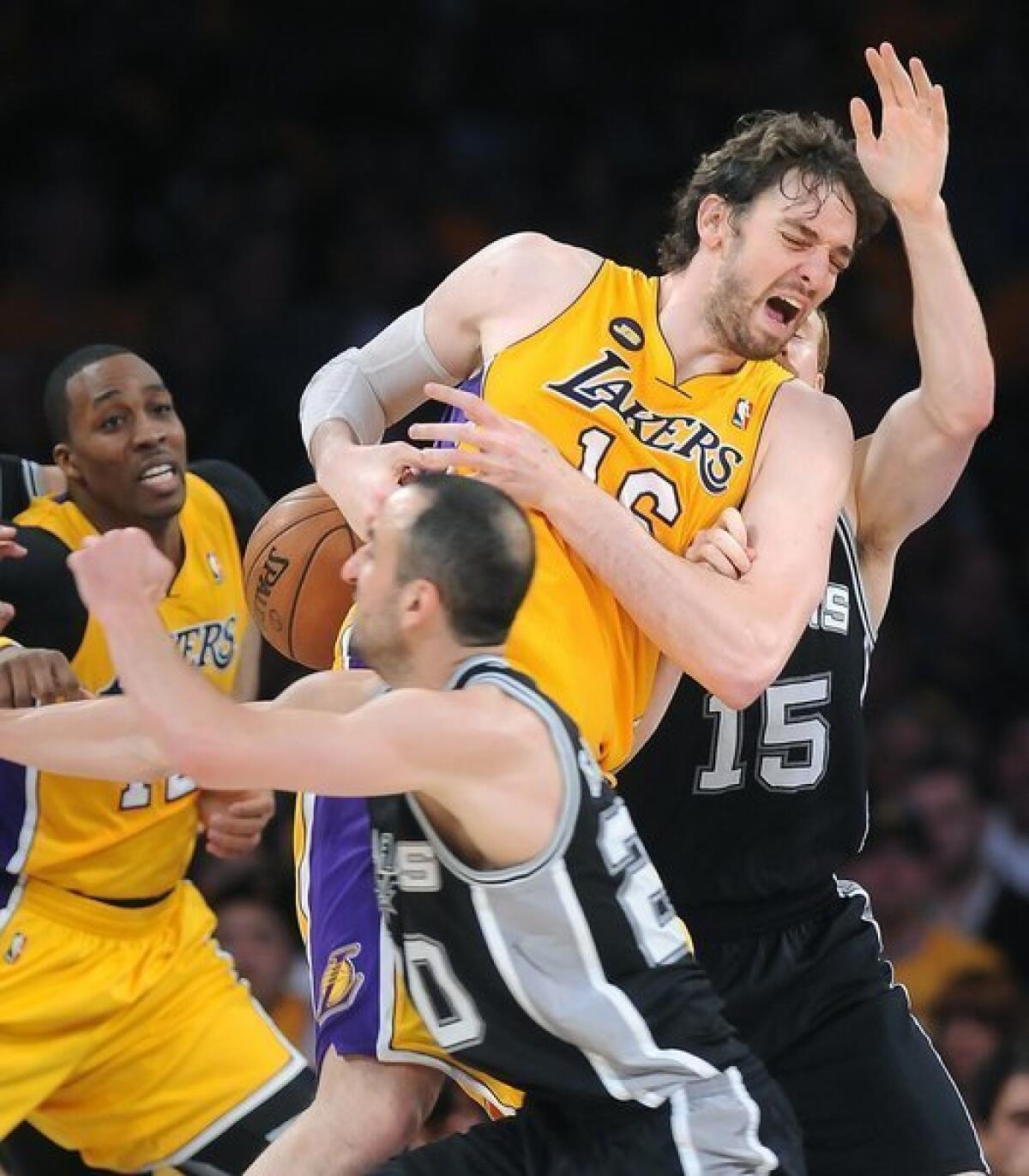 Pau Gasol, top, will undergo a medical procedure to remove scar tissue in both of his knees on Thursday, according to a Lakers release.