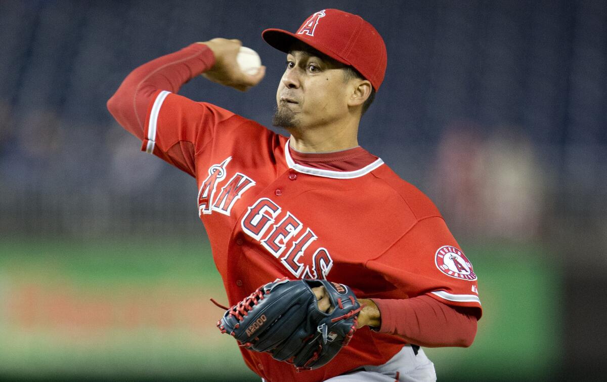 Angels closer Ernesto Frieri delivers a pitch during the ninth inning of the team's 5-4 loss to the Washington Nationals on Wednesday.