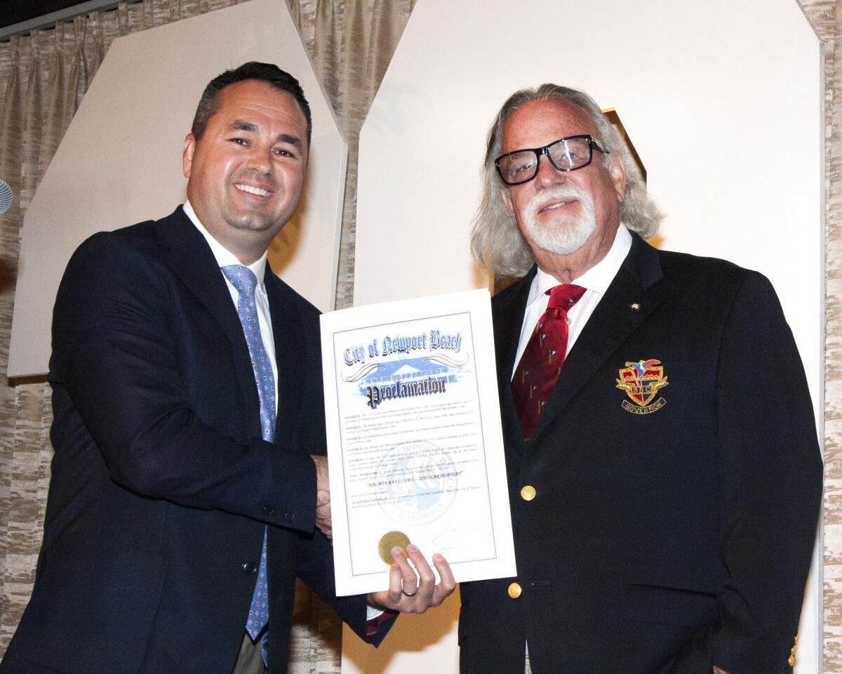 Mayor Kevin Muldoon and Balboa Bay Club Chairman of the Board of Governors John Wortmann.