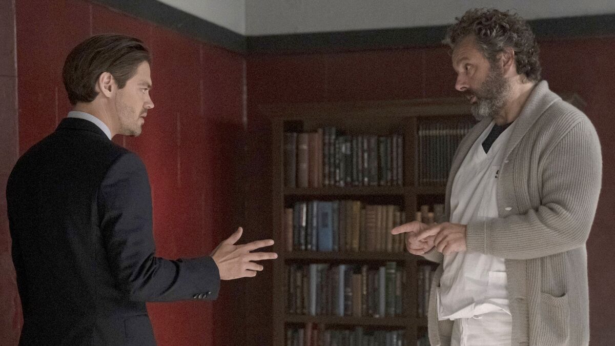 Tom Payne, left, and Michael Sheen in a new episode of "Prodigal Son" on Fox.