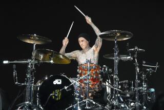 Travis Barker of Blink-182 performs at the Coachella Music and Arts Festival at the Empire Polo Club on Sunday, April 24, 2023, in Indio, Calif. (Photo by Amy Harris/Invision/AP)