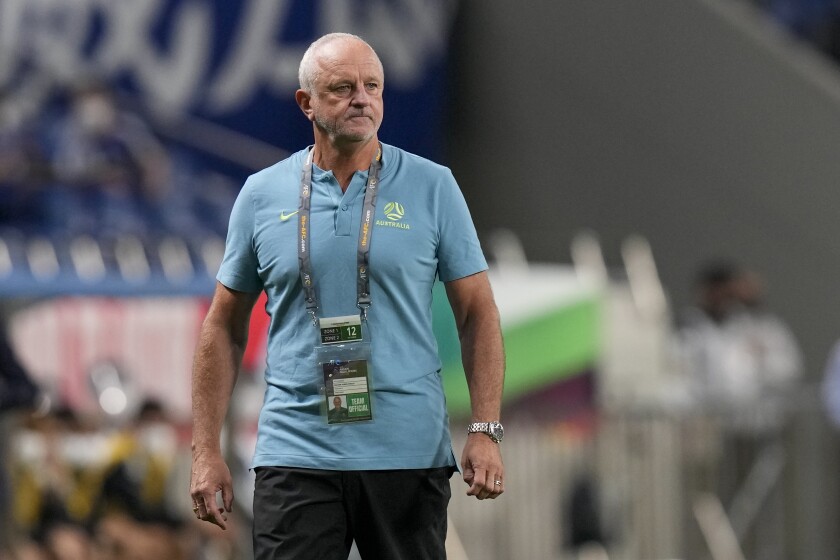 FILE - Australia's head coach Graham Arnold watches play during their World Cup 2022 group B qualifying soccer match between Australia and Japan at Saitama Stadium in Saitama, north of Tokyo on Oct. 12, 2021. Arnold has named Uruguay-born striker Bruno Fornaroli as one of five uncapped players in his squad for Australia's must-win World Cup qualifiers against Japan and Saudi Arabia. (AP Photo/Shuji Kajiyama, File)
