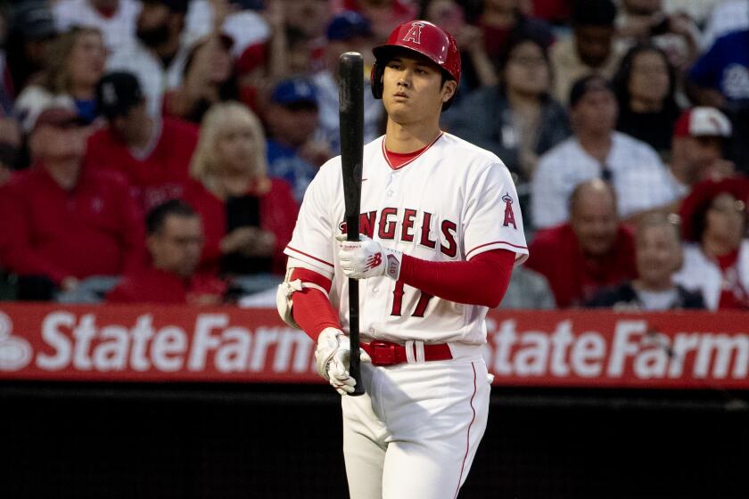 ANAHEIM, CA - JUNE 20, 2023: Los Angeles Angels designated hitter Shohei Ohtani (17) walks to the plate to face Los Angeles Dodgers starting pitcher Clayton Kershaw (22) in the fourth inning at Angel Stadium on June 20, 2023 in Anaheim, California. (Gina Ferazzi / Los Angeles Times)