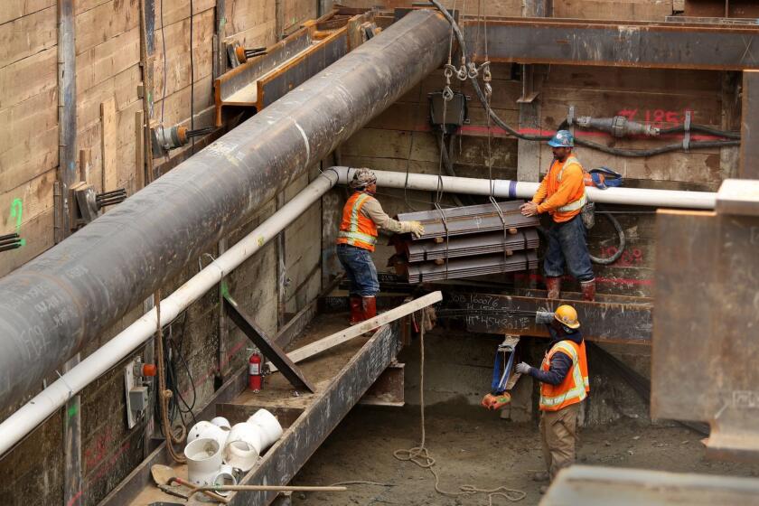 LOS ANGELES CA. JANUARY 4, 2017: Construction of the Purple Line is underway at La Brea and Wilshire on January 4, 2017. The second phase of the Purple Line subway, which will connect Beverly Hills and Century City to downtown Los Angeles by rail, has received billions in federal grants and loans. (Glenn Koenig/ Los Angeles Times)