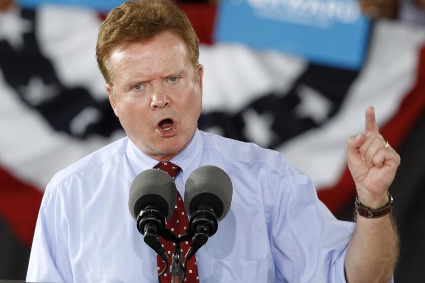 Then-Sen. Jim Webb (D-Va.) as he speaks during a rally for President Obama in Virginia Beach, Va., in 2012.