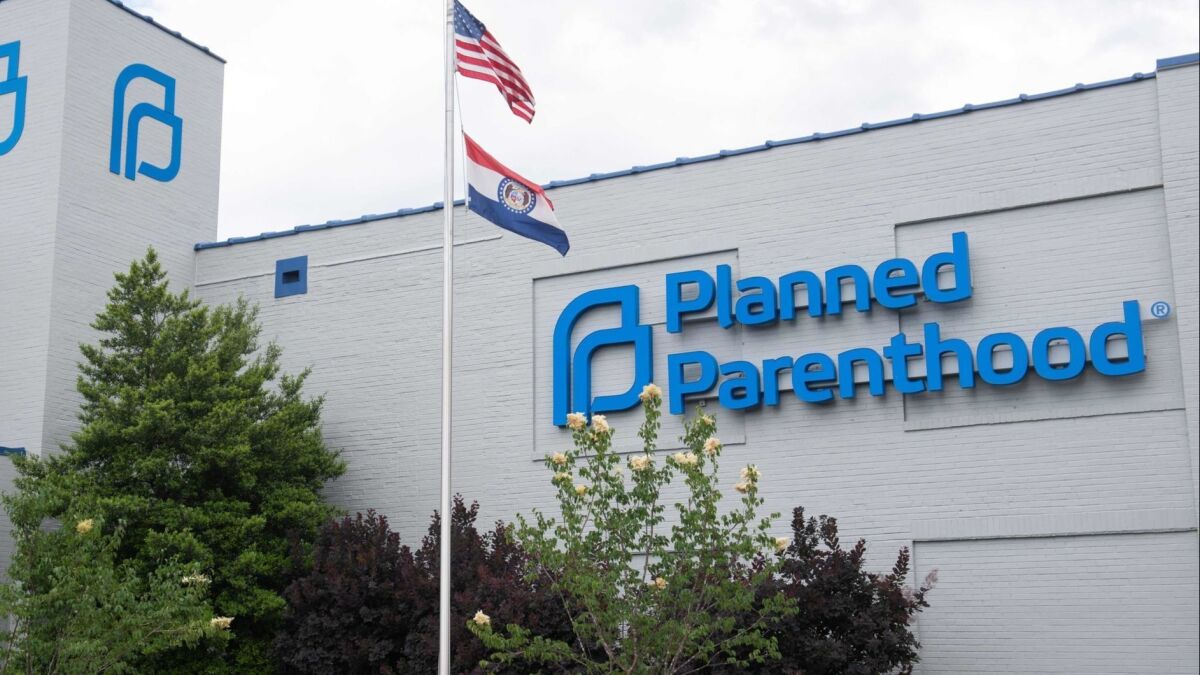 A federal appeals court on Thursday refused to put a hold on President Trump's new rule denying funds to family planning clinics that make abortion referrals. The ruling is a setback for Planned Parenthood and similar groups.
