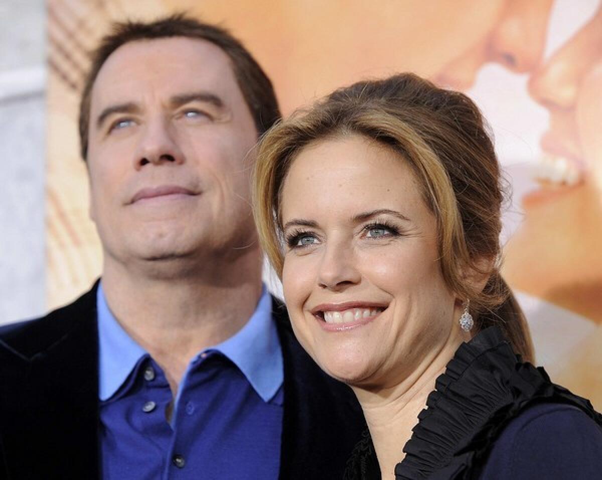 John Travolta y su esposa Kelly Preston.