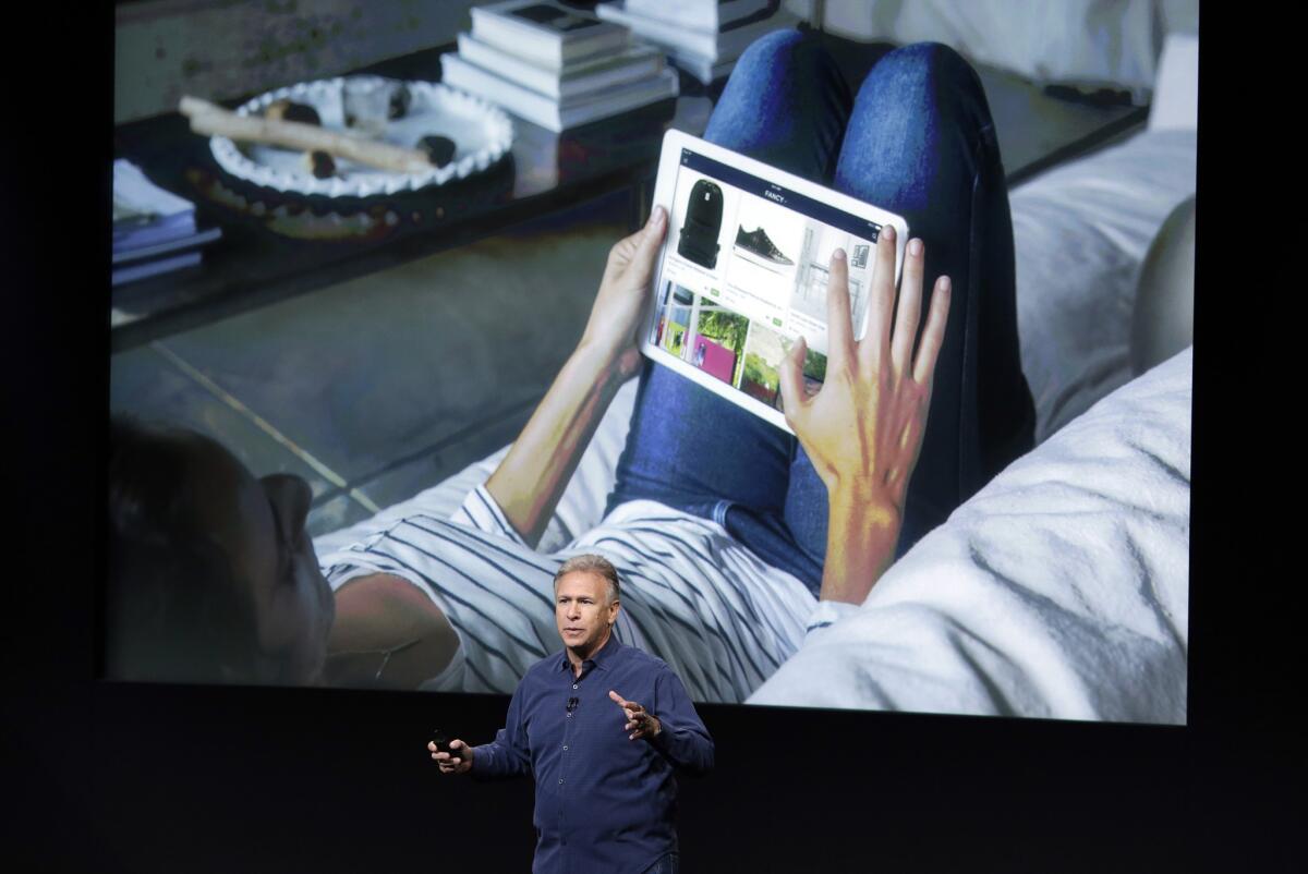 Phil Schiller, Apple's senior vice president of worldwide product marketing, discuss the features of the new Apple iPad Air 2.