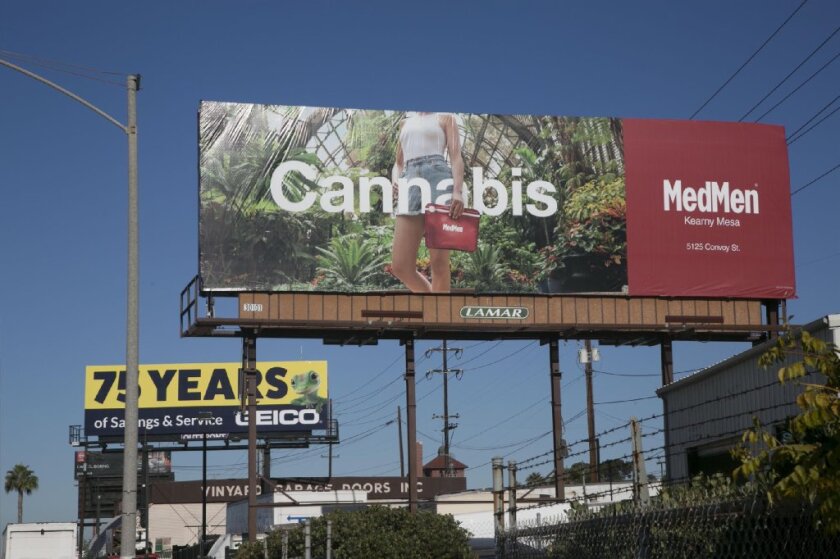 San Diego is proposing to ban billboards for cannabis companies, like this one on Pacific Highway, near parks, schools and other sensitive uses.