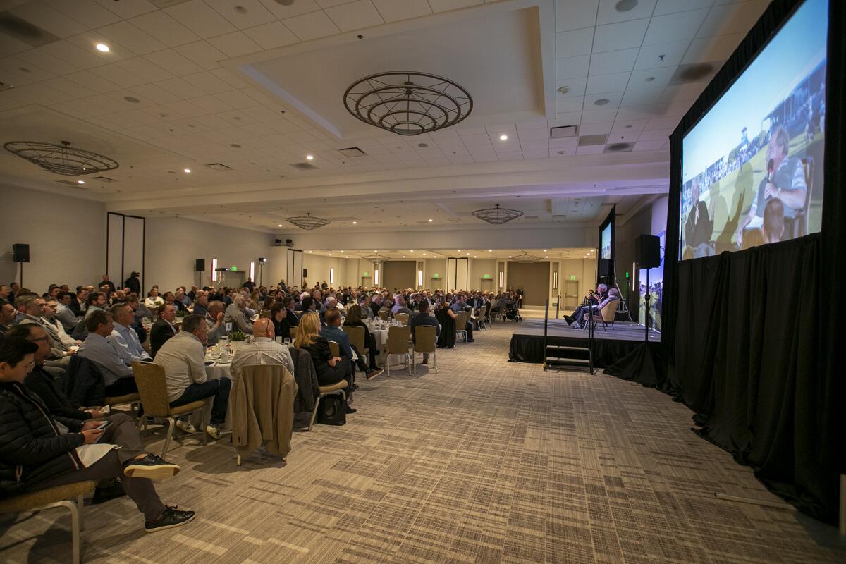 A packed room listens to Fred Couples and moderator Alan Beyer during the Hoag Classic Hall of Fame Community Breakfast.