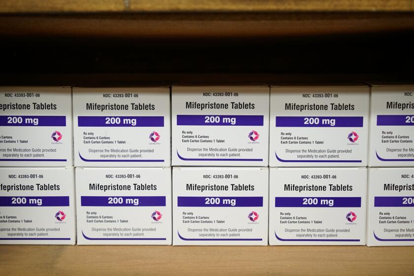 Boxes of the drug mifepristone line a shelf at the West Alabama Women's Center in Tuscaloosa, Ala., on Wednesday, March 16, 2022. The drug is one of two used together in "medication abortions." According to Planned Parenthood, mifepristone blocks progesterone, stopping a pregnancy from progressing. (AP Photo/Allen G. Breed)