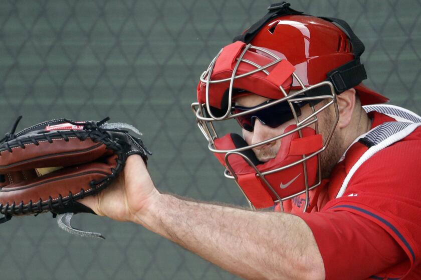 Angels catcher Chris Iannetta takes part in a spring training workout session on Feb. 20, 2015.