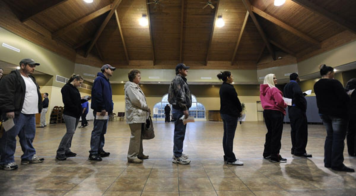 Voters line up to cast ballots in the general election at Barrow County's Precinct 16 at Bethlehem Christian Academy in Bethlehem, Ga.