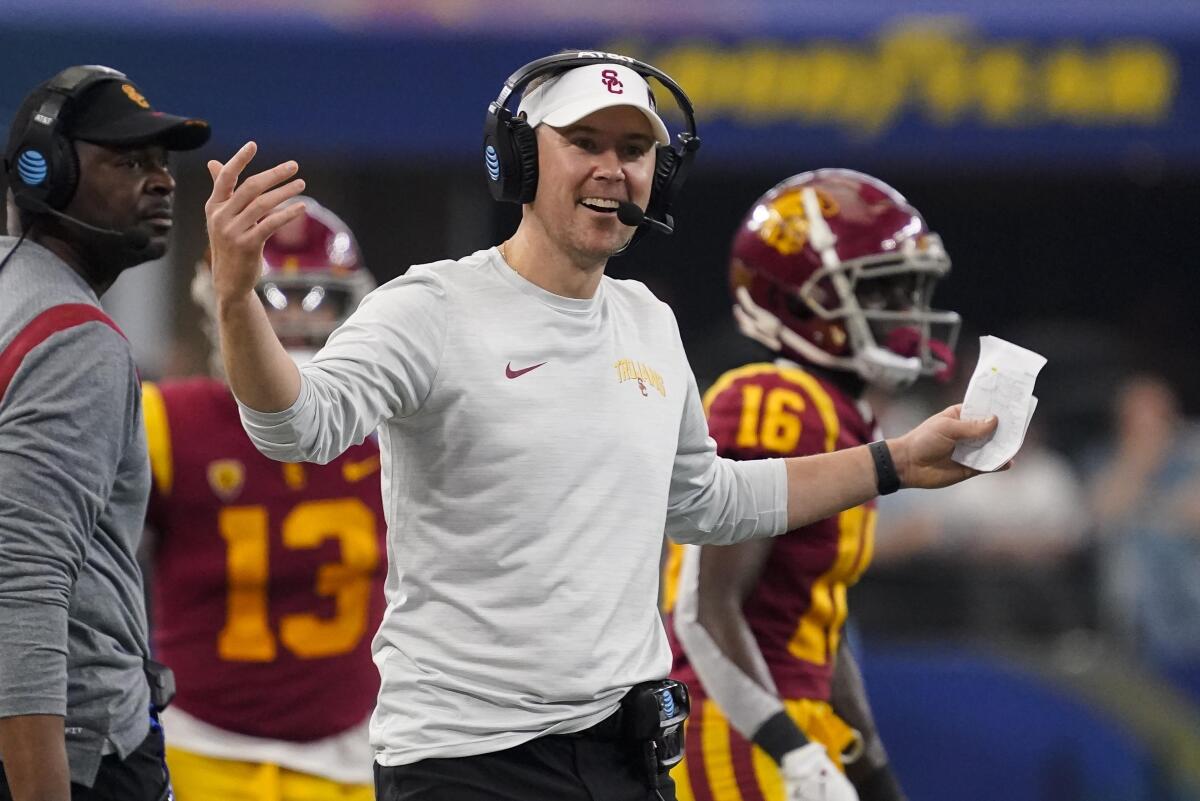 USC coach Lincoln Riley gestures on the sideline during the second half of a loss to Tulane 