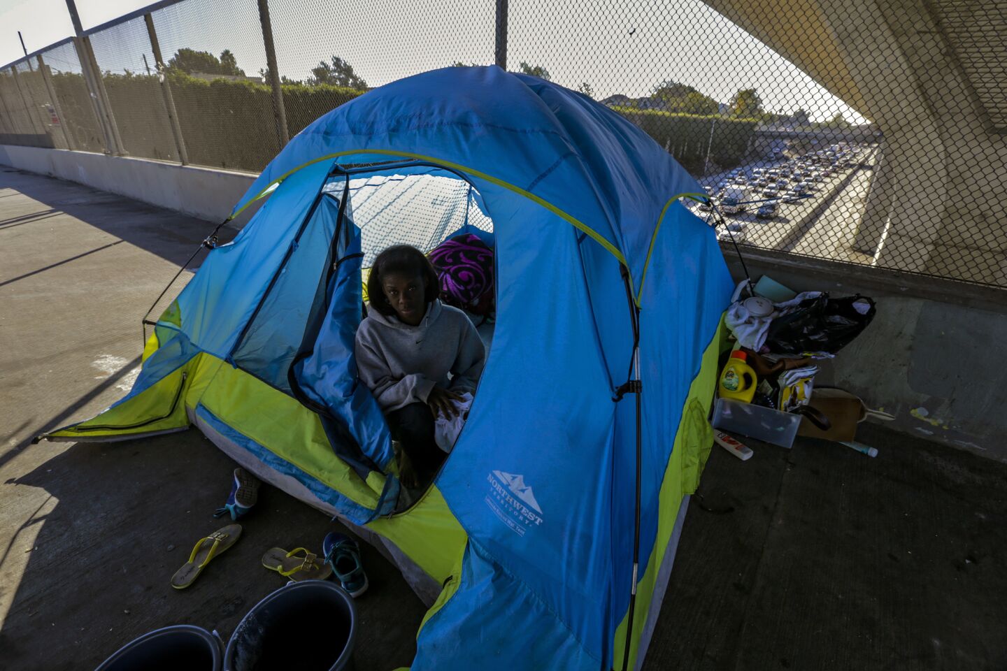 Debra Jackson lives in a tent pitched over 42nd Street bridge over 110 Freeway in Los Angles.