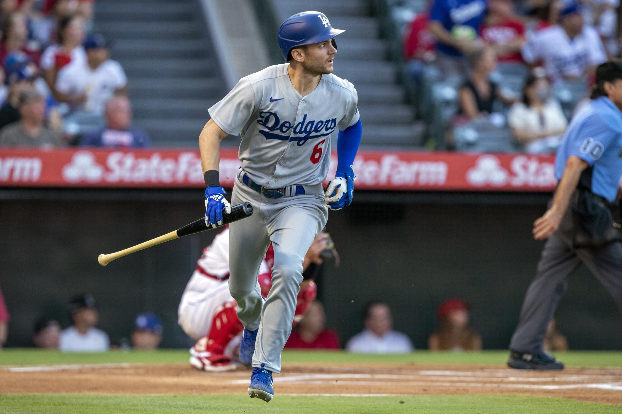 The Dodgers' Trea Turner watches his solo home run against the Angels during the first inning July 16, 2022. 