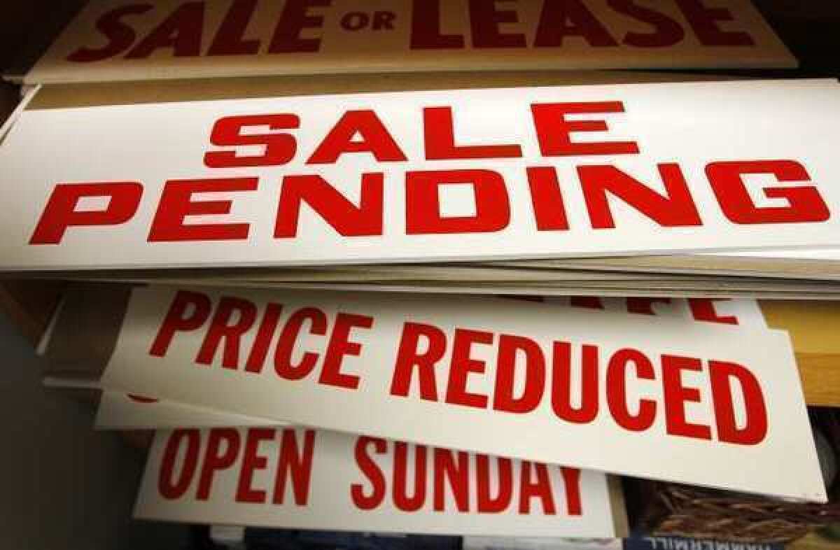 Pending home sales were down month to month but are up compared with last year, according to the National Assn. of Realtors