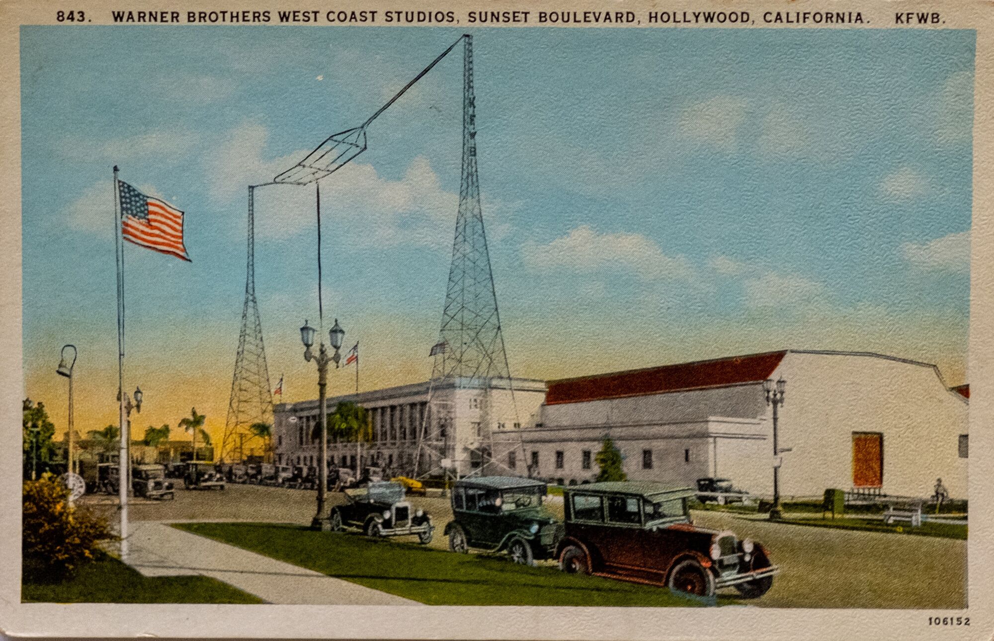A historical postcard of a movie studio exterior. 