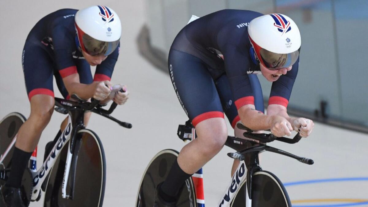 Britain's Katie Archibald and Laura Trott, left, compete in the women's Team Pursuit finals at the 2016 Summer Games.