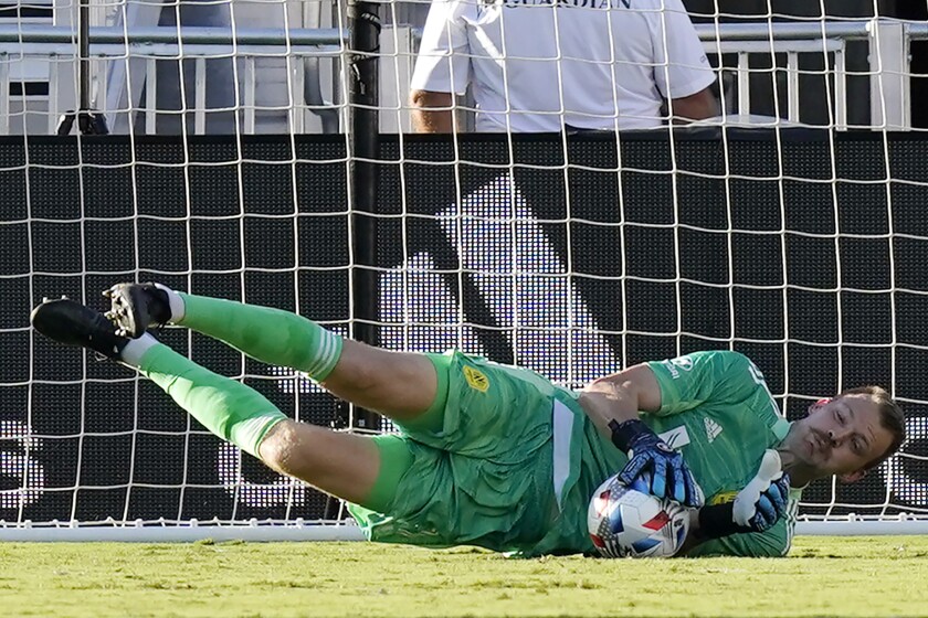 Nashville goalkeeper Joe Willis stops a shot during a against Inter Miami on Aug. 8