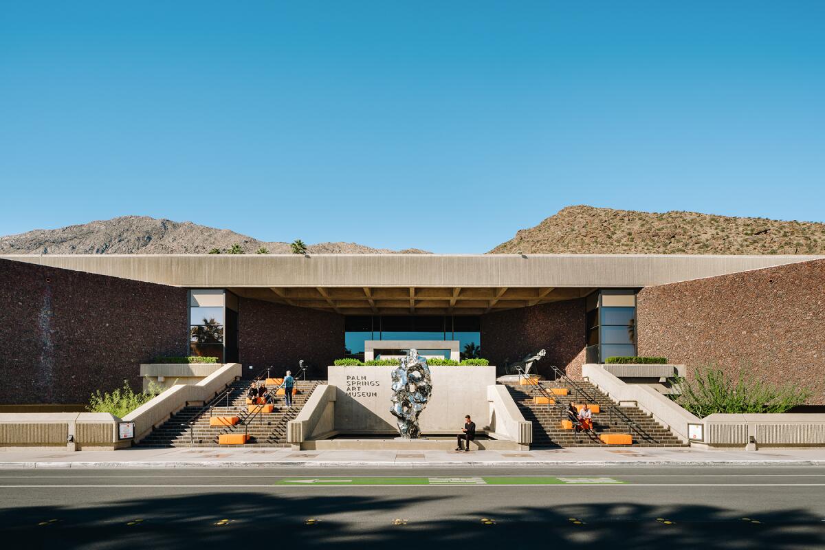 The stone and concrete exterior of the Palm Springs Art Museum.