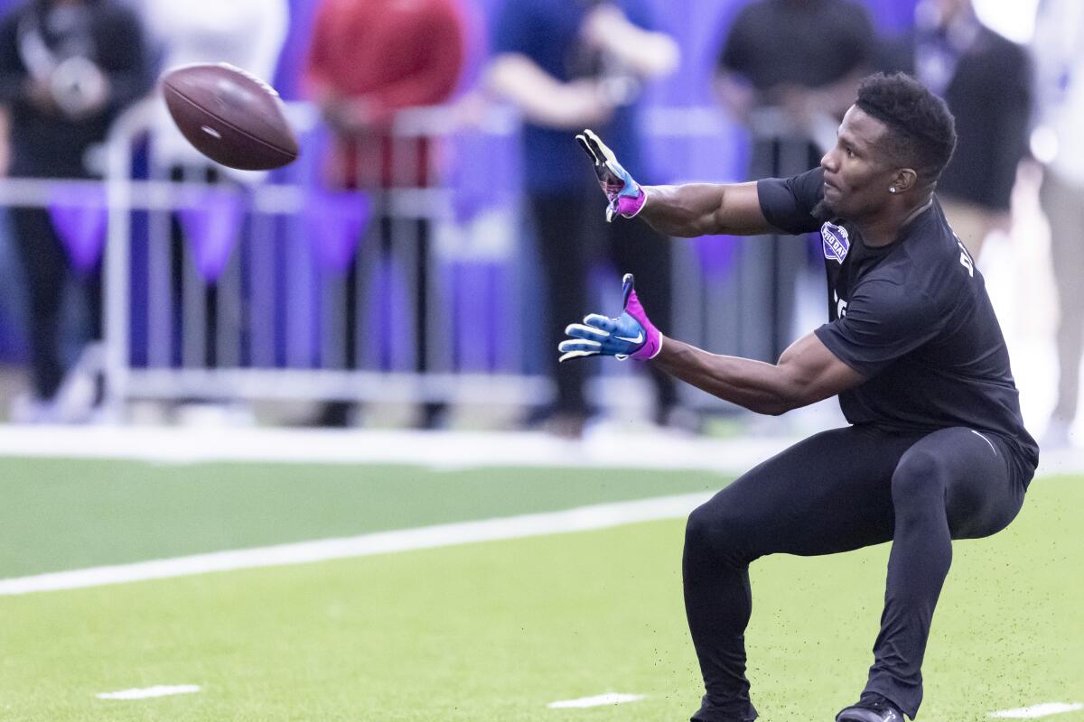 Wide receiver Derius Davis (11) catches a pass during Pro Day at Texas Christian.