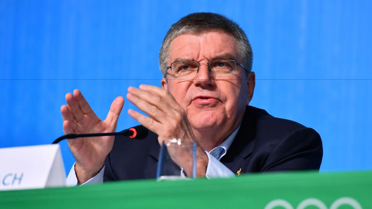 IOC President Thomas Bach speaks during a news conference Sunday.