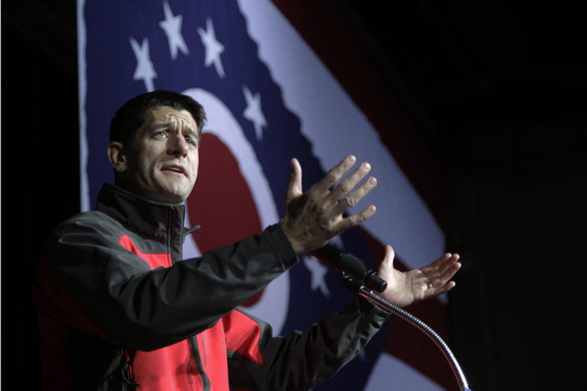 Republican vice presidential candidate Paul D. Ryan addresses a late-night rally in Vienna, Ohio.