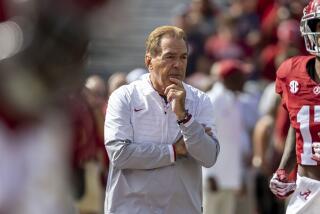 Alabama coach Nick Saban watches his team warm up before playing Tennessee on Oct. 21 in Tuscaloosa, Ala. 
