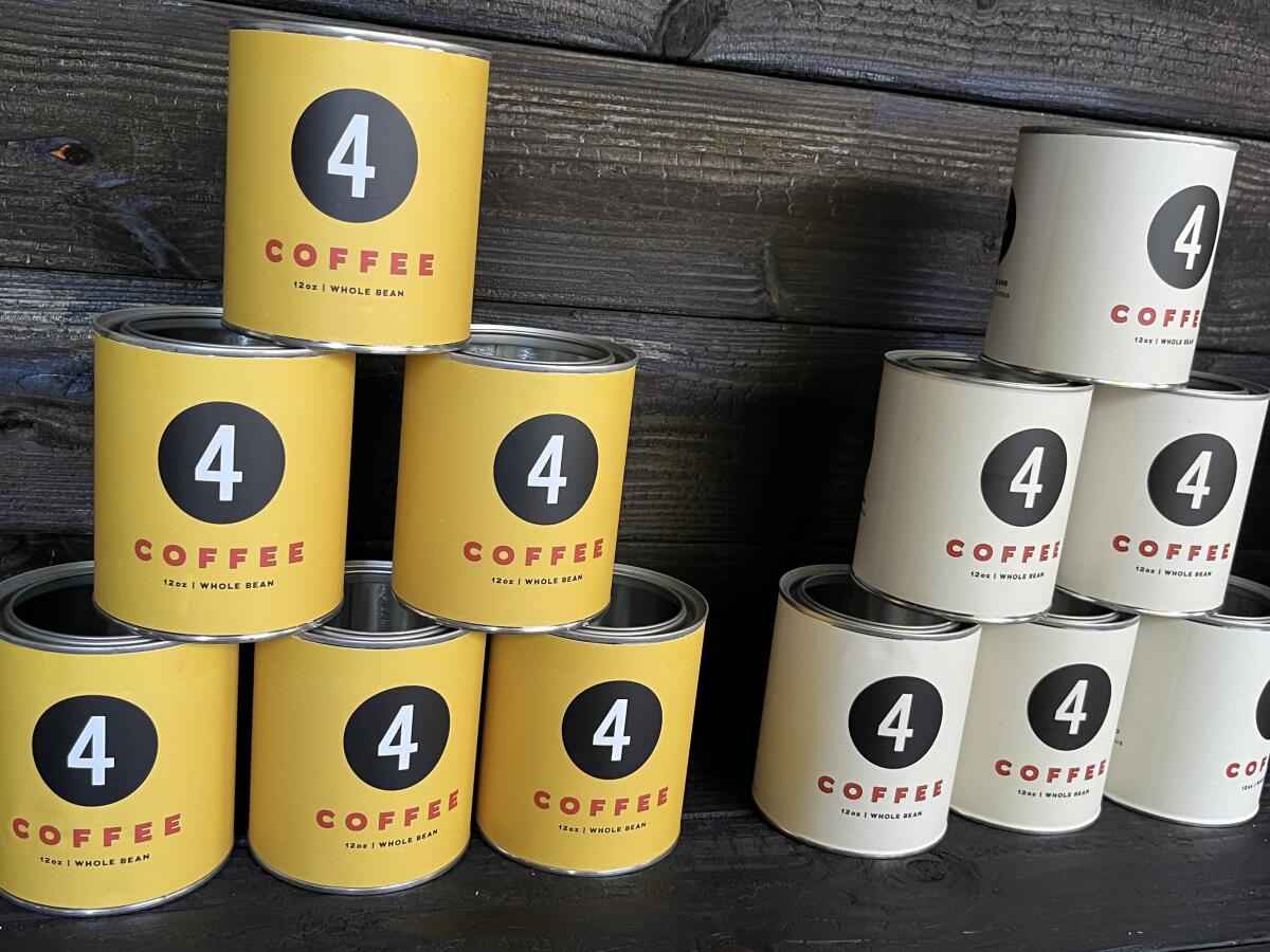 Four Coffee sold in tins at Fourtillfour Cafe.
