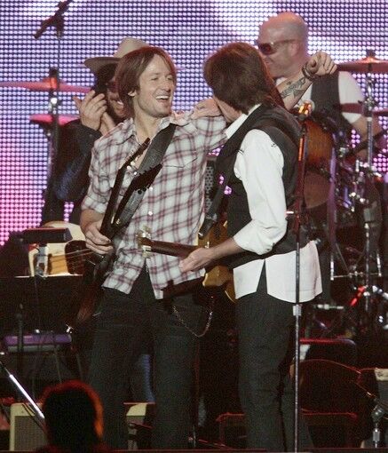Keith Urban, left, and John Fogerty
