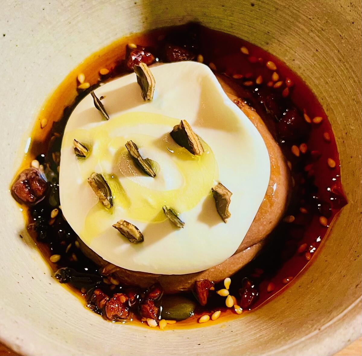 Chocolate mouse with salsa macha, whipped cream and roasted kelp at Sanchez in Copenhagen.