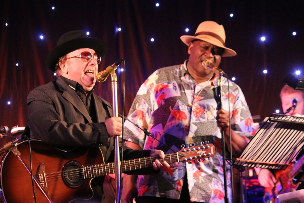 Van Morrison, left, is shown performing Taj Mahal in Northern Ireland in 2014. Mahal is featured on Morrison's album, "Duets: Re-Working the Catalogue."