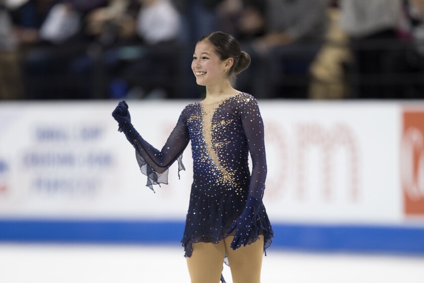 Alysa Liu, 14, gives a fist pump after her free skate program at the U.S. Figure Skating Championships on Jan. 24, 2020.