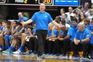 HONOLULU, HI - NOVEMBER 20: Head coach Mike Cronin of the UCLA Bruins argues a call during day one of the Allstate Maui Invitational college basketball game against the Marquette Golden Eagles at the SimpliFi Arena at Stan Sheriff Center on November 20, 2023 in Honolulu, Hawaii. (Photo by Mitchell Layton/Getty Images)