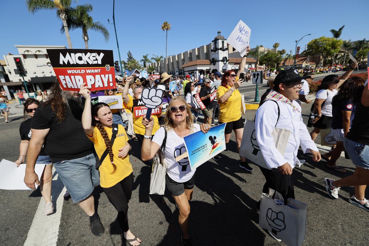 Cast members rally outside Disneyland's main entrance on July 17 ahead of a strike authorization vote.