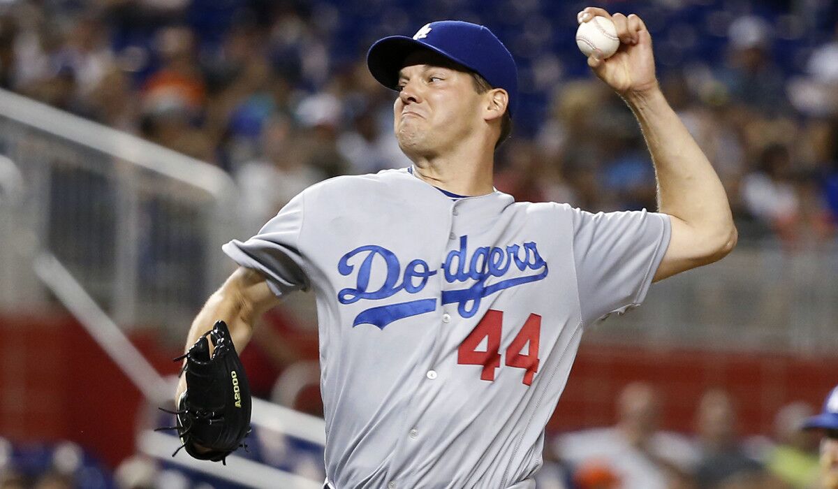 Dodgers pitcher Rich Hill delivers a pitch during the first inning against the Miami Marlins Saturday.