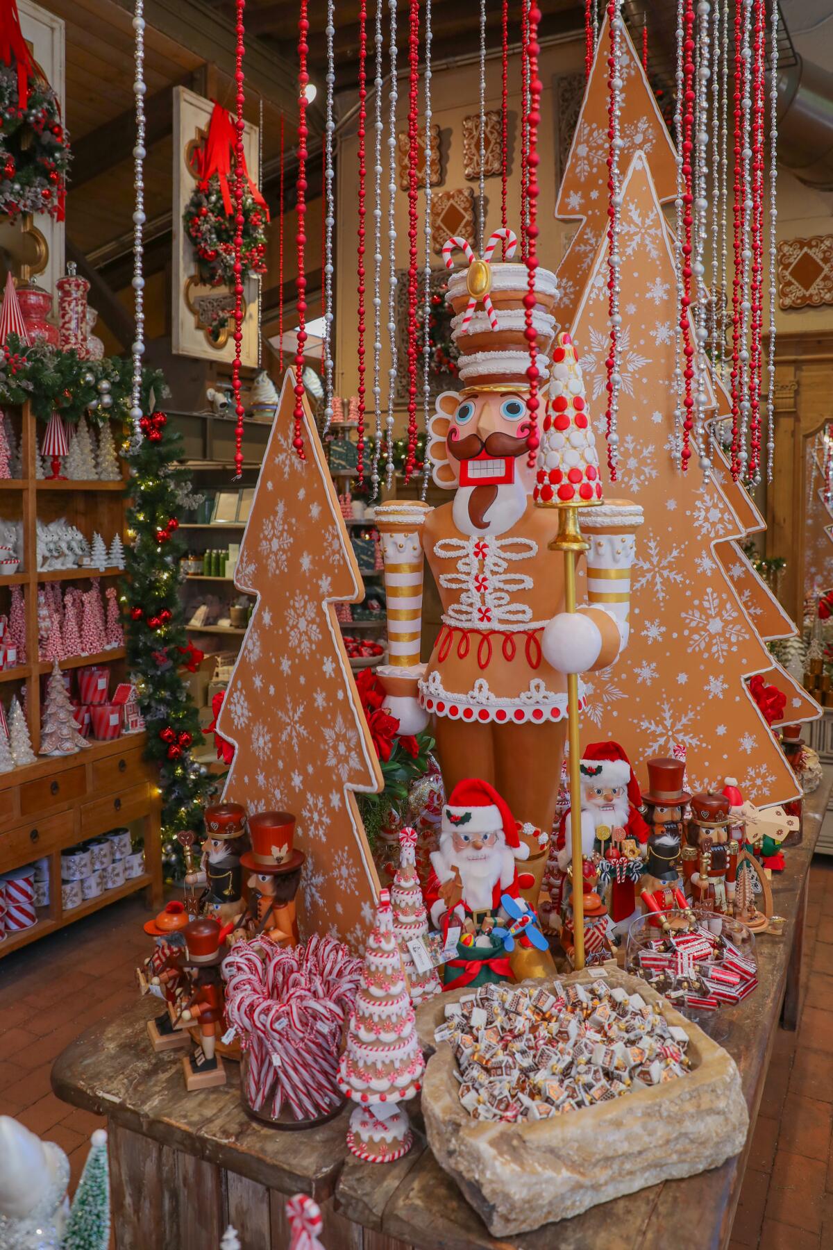 Roger's Gardens exhibit inspired by frosted gingerbread and peppermint swirls.