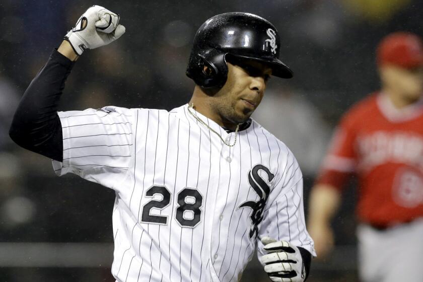 White Sox pinch-hitter Leury Garcia celebrates after hitting the game-winning single against the Angels in the ninth inning Wednesday night in Chicago.