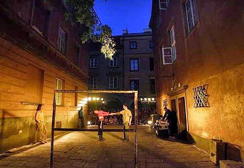 A performance of "Slam" is produced in a Warsaw alley that's both a stage and a prop for the contemporary piece.