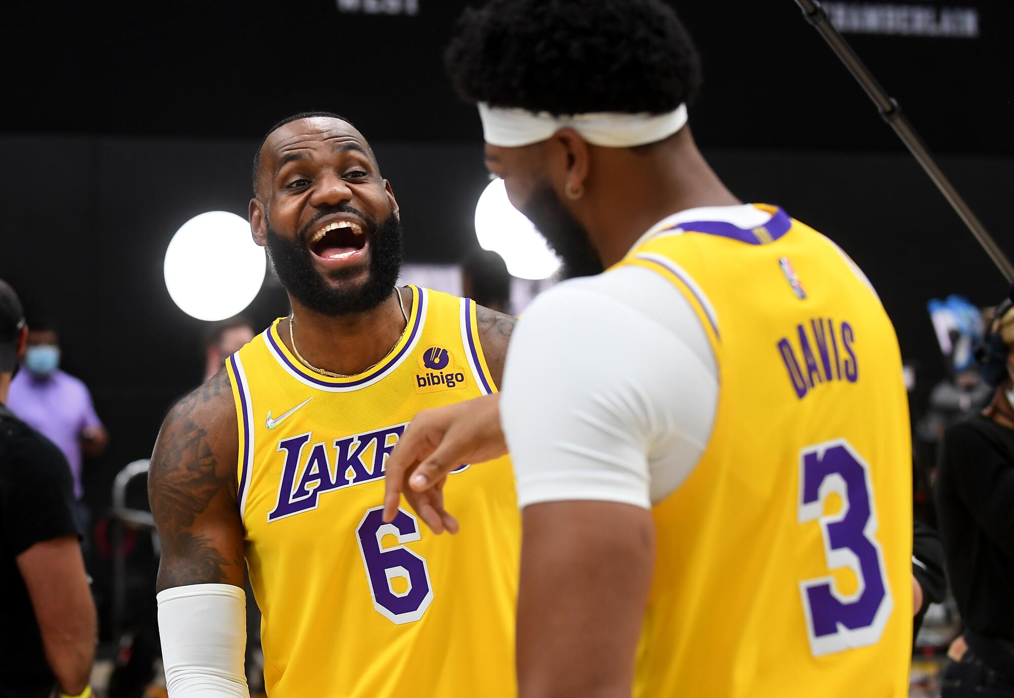 Lakers Lebron James, left, and Anthony Davis share a laugh during media day.