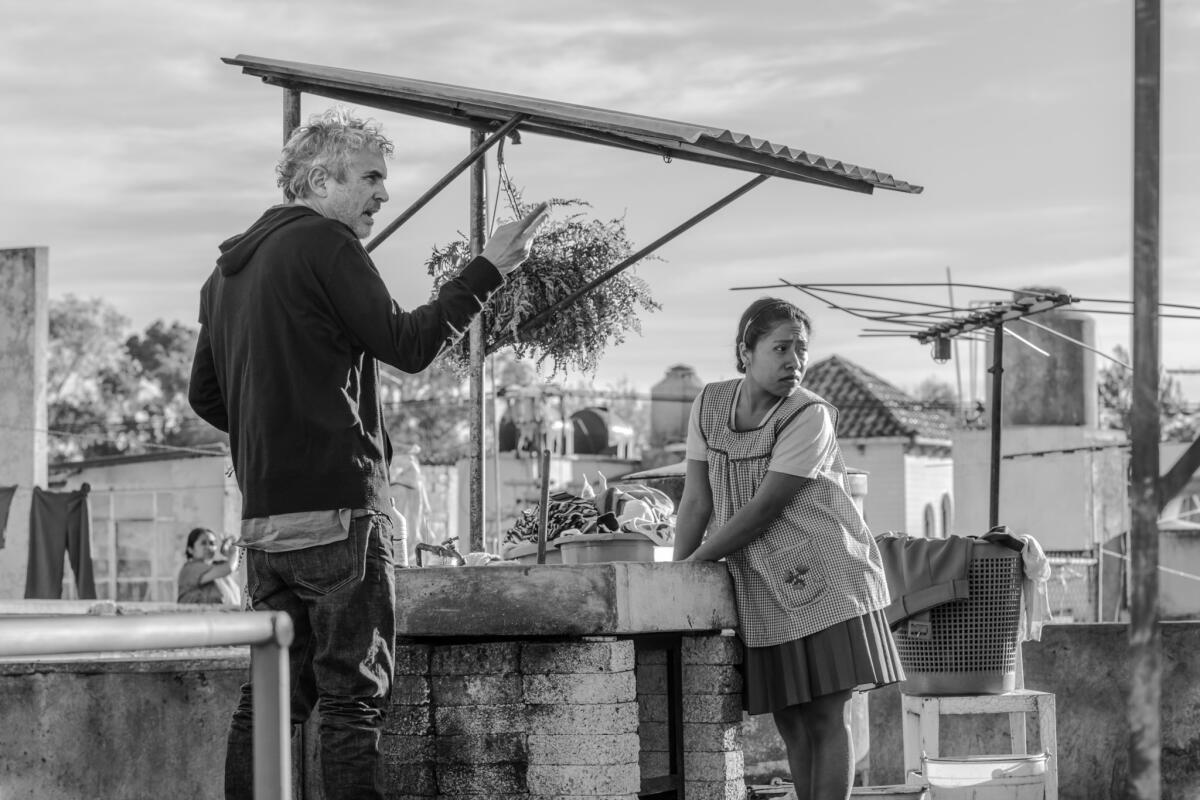 Alfonso Cuarón directs a scene on the set of "Roma." 