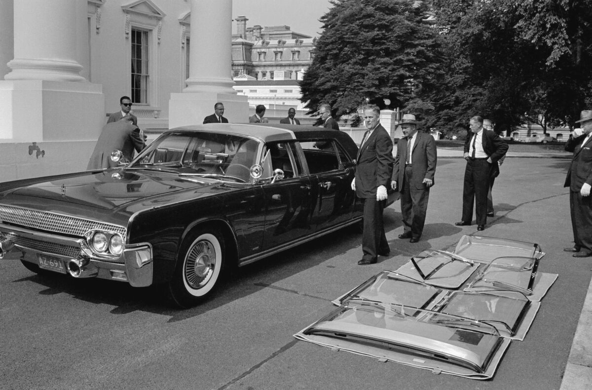 FILE—This file photo from June 14, 1961 shows the plastic-topped limousine for Pres. John F. Kennedy's as it sits outside the White House, after its delivery in Washington. The O’Gara Hess Eisenhardt Armoring Company filed a notice last week, March 10 ,2022, that it will layoff all of its employees in Fairfield, Ohio, and close permanently.. (AP Photo/Henry Burroughs, File)