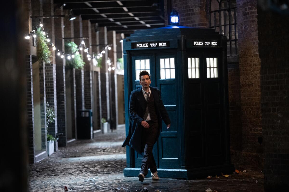 The Doctor walking away from the TARDIS.