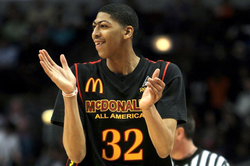 Anthony Davis reacts while playing for the West in the 2011 McDonald's All-America game.